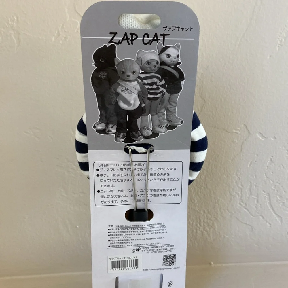 Highly collectible Japanese Zap Cat plush figure. Grey kitty. New on stand.